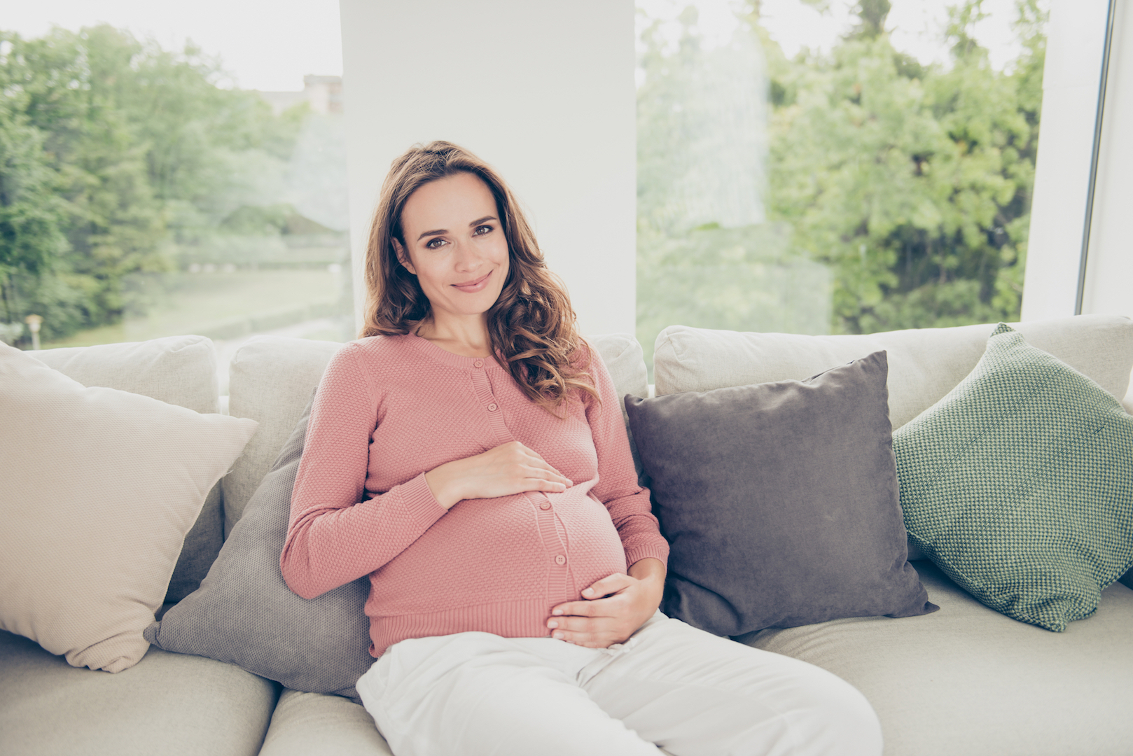 Pregnant Women Holding Belly