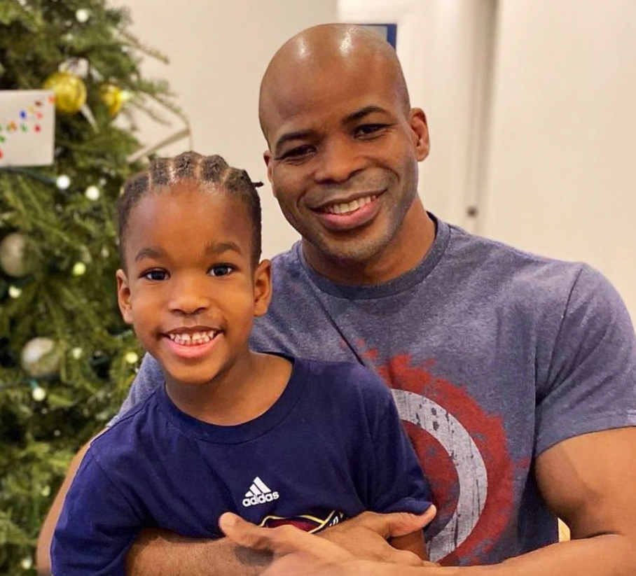 Ngo with Chioma in front of Christmas tree