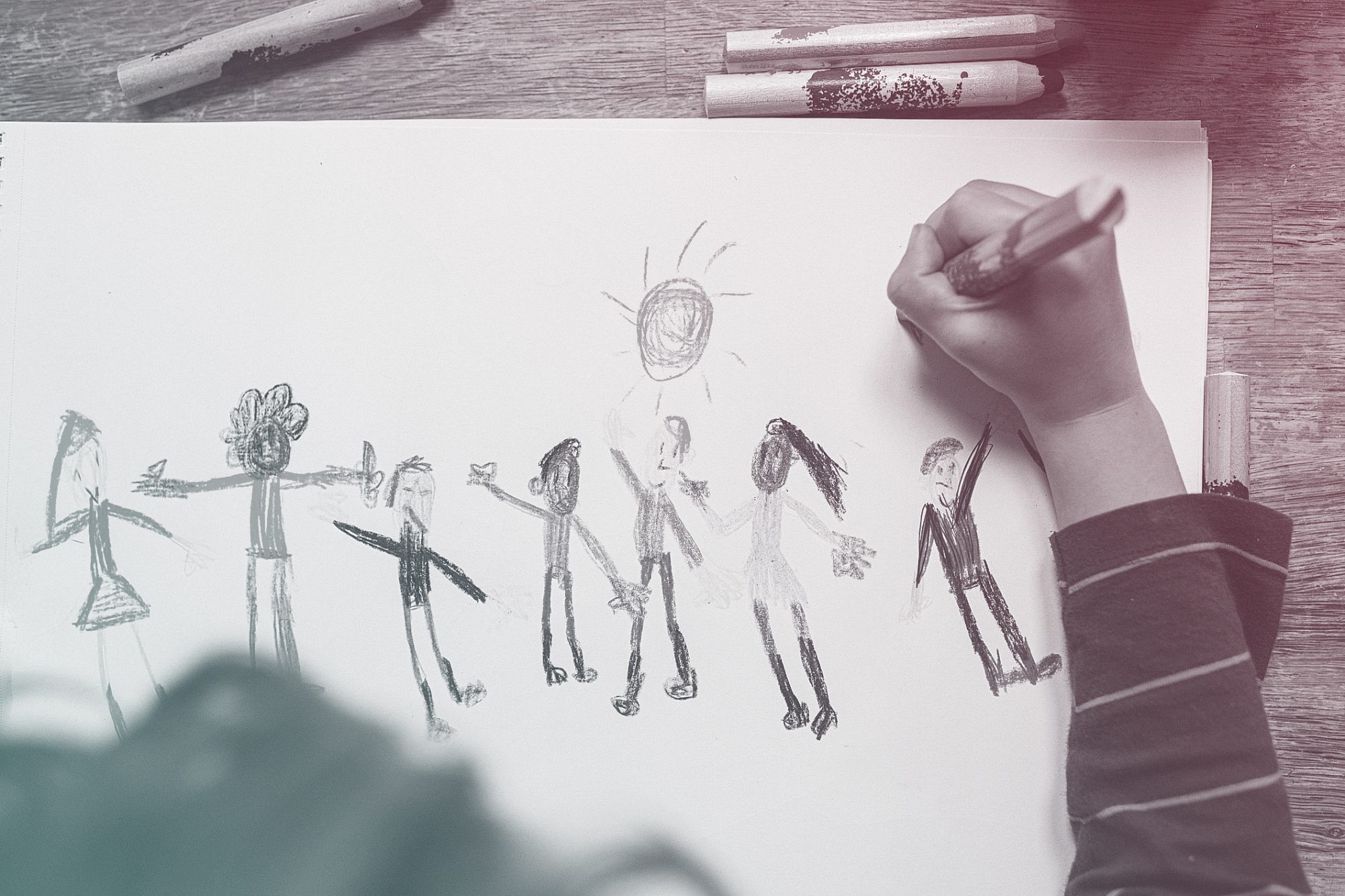 child drawing figures