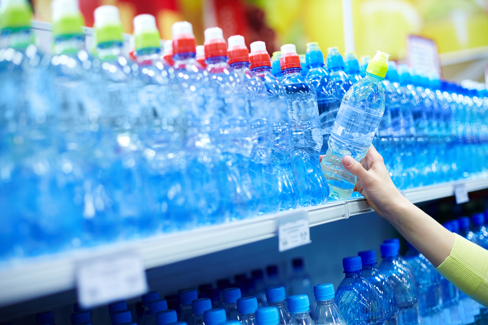 woman buying bottled water