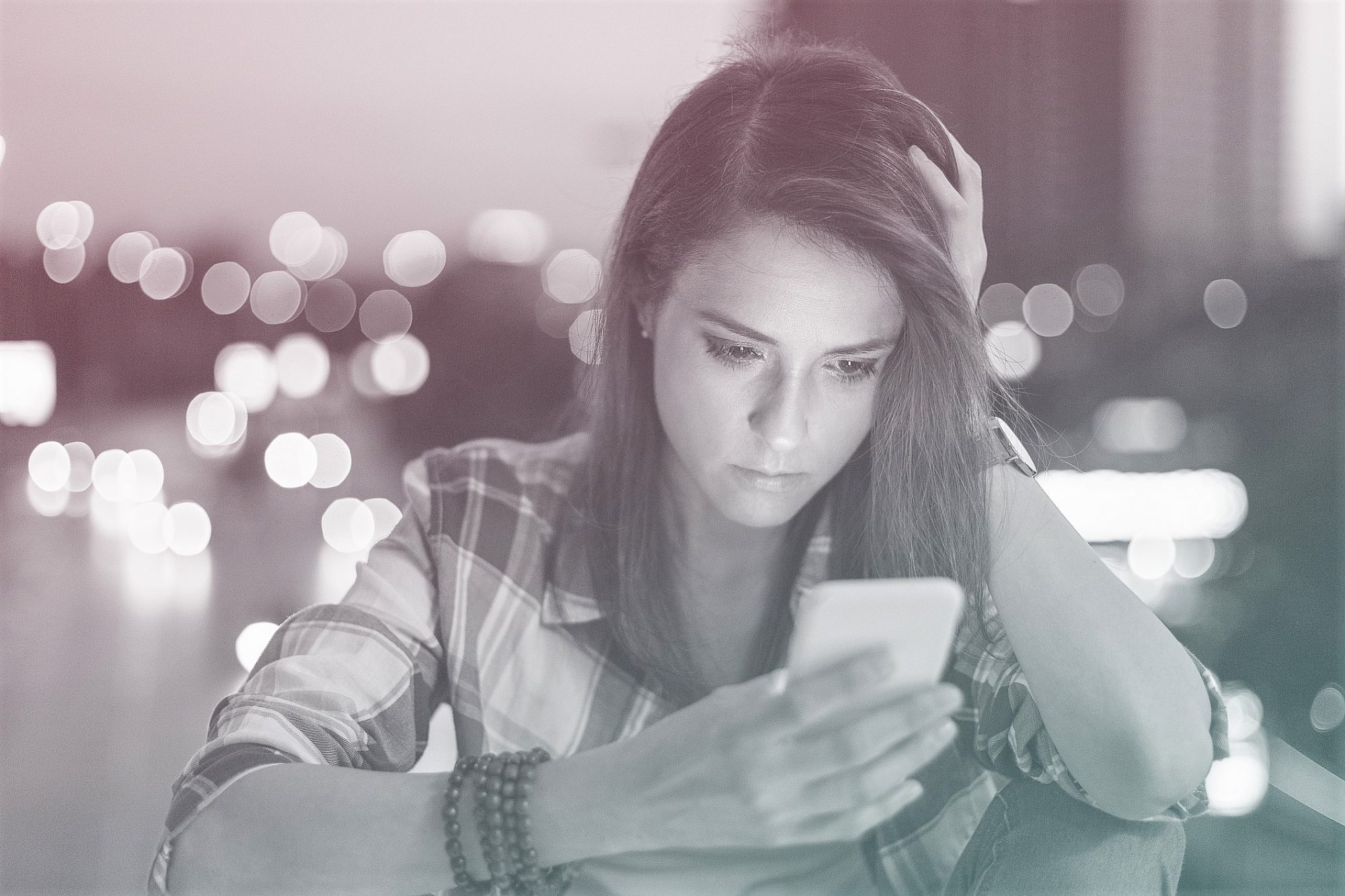 depressed woman on phone