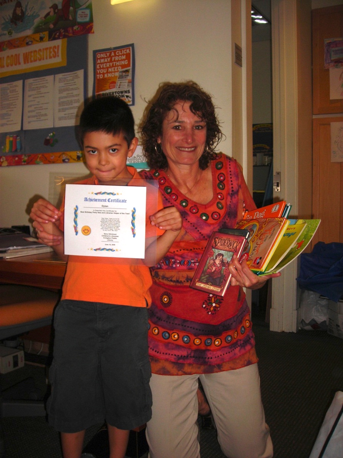 The author's son with his local librarian.