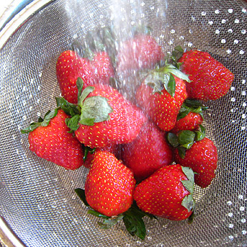 Wash strawberries