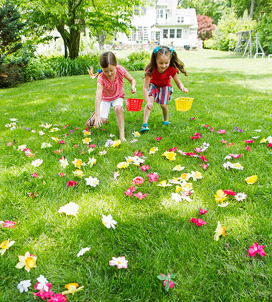 Girls on grass with flowers