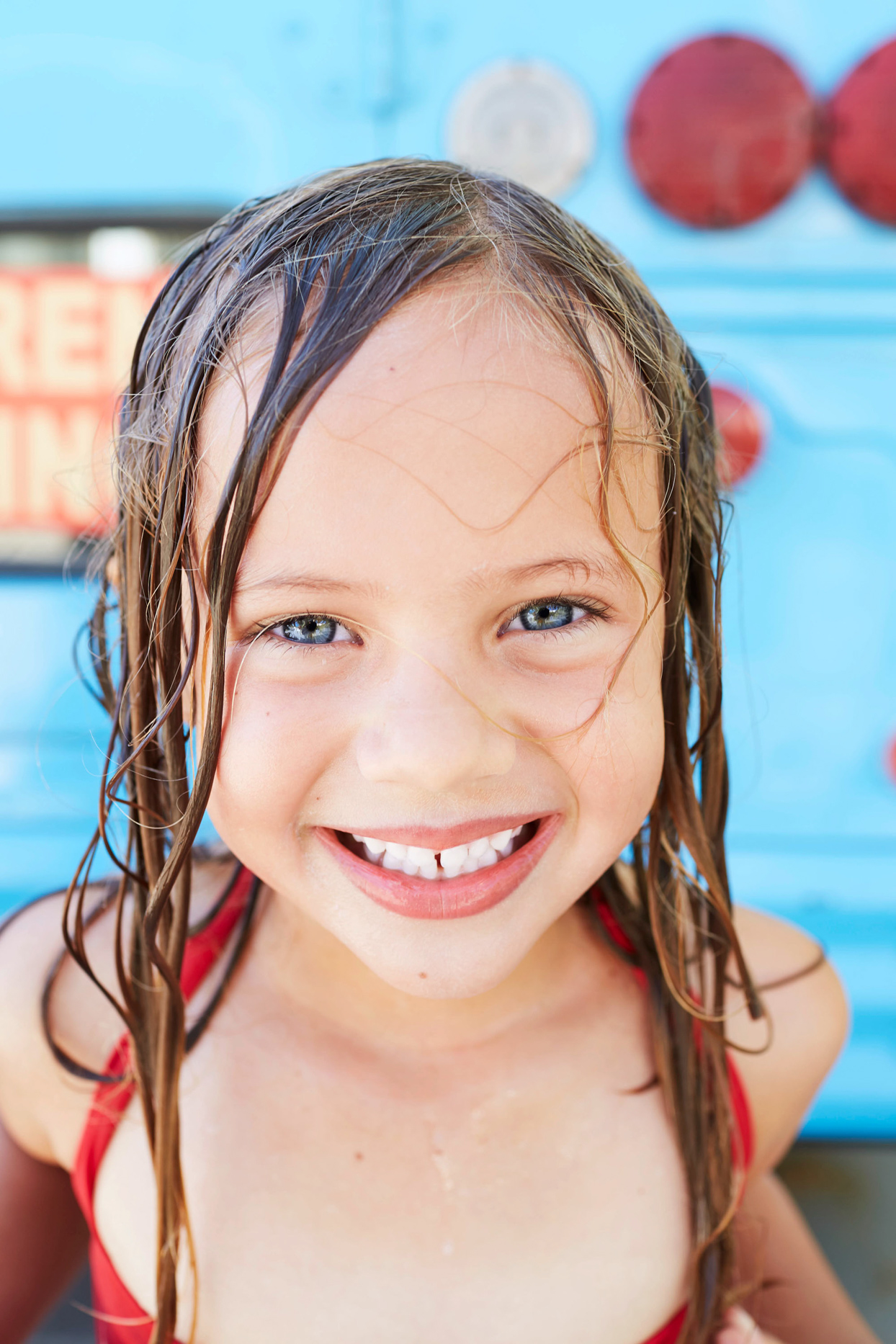 girl in swimsuit with wet hair