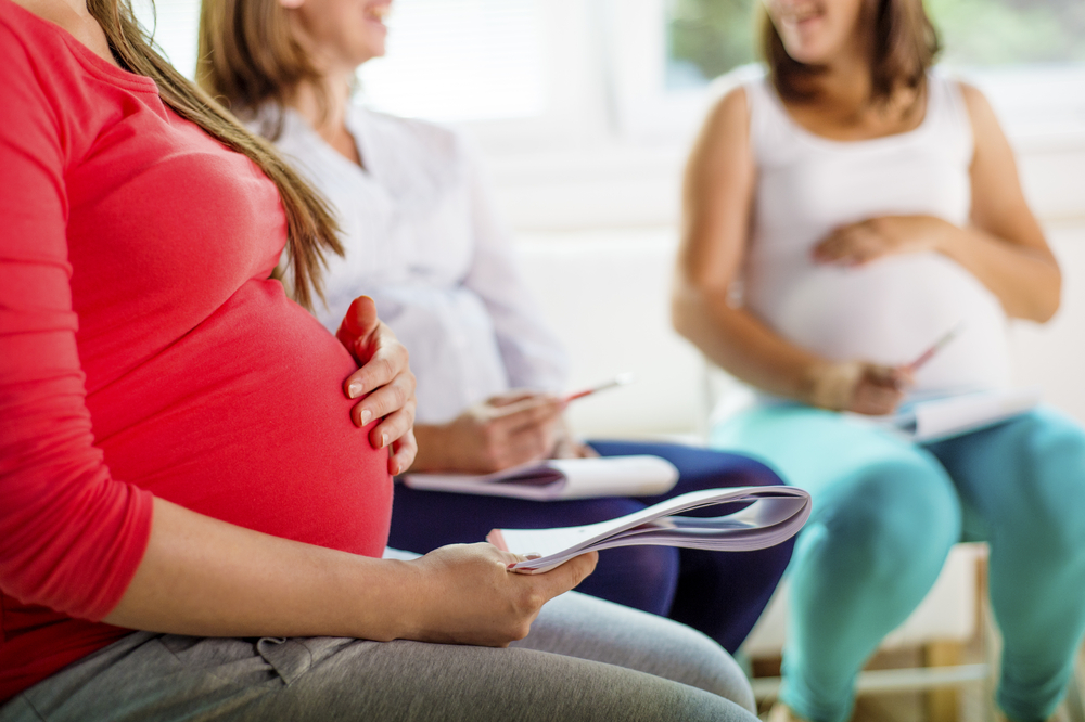 Pregnant women meeting at antenatal class