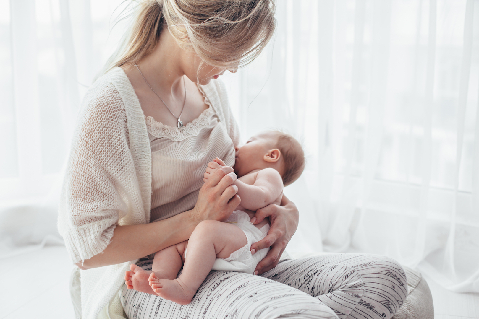 Mom breastfeeding her baby.